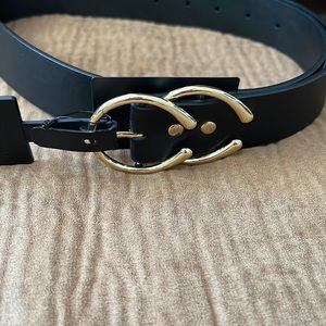 Black belt with gold buckle